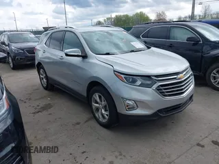 2018 Chevrolet Equinox Premier with VIN 2GNAXMEV7J6106781, listed as a IAAI auction lot 42113301 with 114,585 mi miles. Bid and sale history available at carsss.com. Image 1.