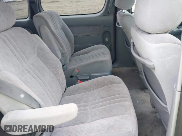 1999 Toyota Sienna LE with VIN 4T3ZF13C7XU152879, listed as a IAAI auction lot 41974953 with 201,644 mi miles. Bid and sale history available at carsss.com. Image 8.