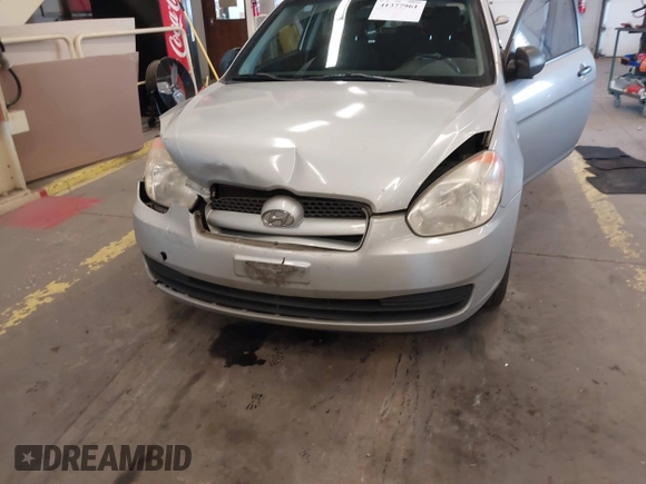 2008 Hyundai Accent GS with VIN KMHCM36C78U066341, listed as a IAAI auction lot 41377961 with 354,357 mi miles. Bid and sale history available at carsss.com. Image 6.
