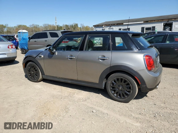 2019 MINI Hardtop 4 Door Cooper with VIN WMWXU1C52K2J02579, listed as a Copart auction lot 53507295 with 94,350 mi miles and Salvage Title. Bid and sale history available at DreamBid. Image 2.