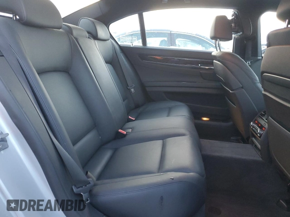 2014 BMW 7 Series 740Li xDrive with VIN WBAYF4C57ED281954, listed as a Copart auction lot 85297394 with 63,535 mi miles and Salvage Title. Bid and sale history available at carsss.com. Image 10.