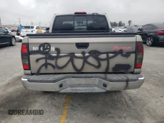 2000 Nissan Frontier XE with VIN 1N6ED27T8YC357939, listed as a Copart auction lot 55727395 with 143,842 mi miles and Salvage title. Bid and sale history available at DreamBid. Image 6.