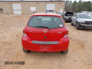 2009 Toyota Yaris with VIN JTDJT903595243068, listed as a IAAI auction lot 41899358 with 310,199 mi miles. Bid and sale history available at carsss.com. Image 16.