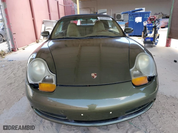 1999 Porsche 911 Carrera with VIN WP0CA2990XS650386, listed as a Copart auction lot 66893064 with 134,519 mi miles and Salvage Title. Bid and sale history available at carsss.com. Image 5.