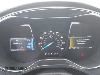 2015 Ford Fusion Titanium with VIN 3FA6P0K94FR120318, listed as a IAAI auction lot 41380325 with 137,910 mi miles. Bid and sale history available at carsss.com. Image 7.