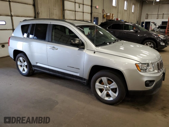 2012 Jeep Compass Sport with VIN 1C4NJCBB0CD677758, listed as a Copart auction lot 53929125 with 156,835 mi miles and Clean Title. Bid and sale history available at carsss.com. Image 4.