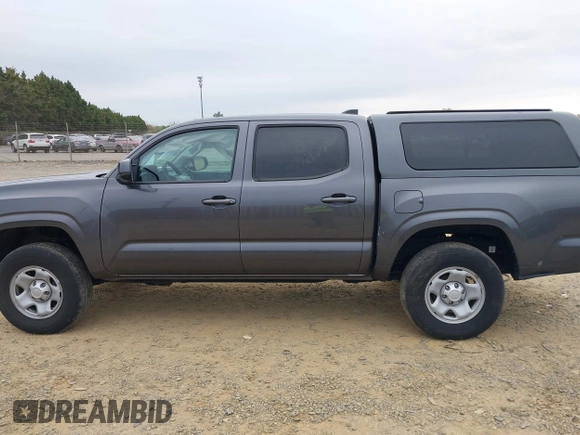 2022 Toyota Tacoma SR with VIN 3TYCZ5AN3NT078324, listed as a IAAI auction lot 42007132 with 35,802 mi miles and . Bid and sale history available at DreamBid. Image 15.