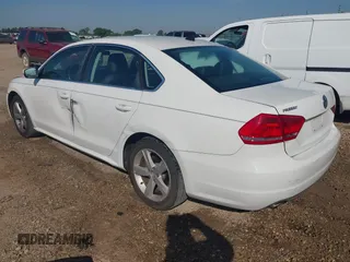 2012 Volkswagen Passat SE with VIN 1VWBH7A32CC091887, listed as a IAAI auction lot 41996295 with 163,011 mi miles. Bid and sale history available at carsss.com. Image 3.