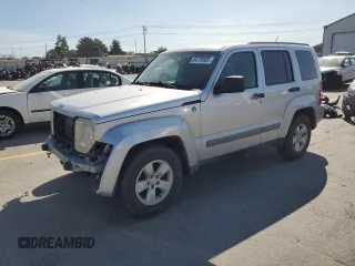 2010 Jeep Liberty Sport with VIN 1J4PN2GKXAW132405, listed as a Copart auction lot 64779585 with 215,238 mi miles and Salvage title. Bid and sale history available at DreamBid. Image 1.