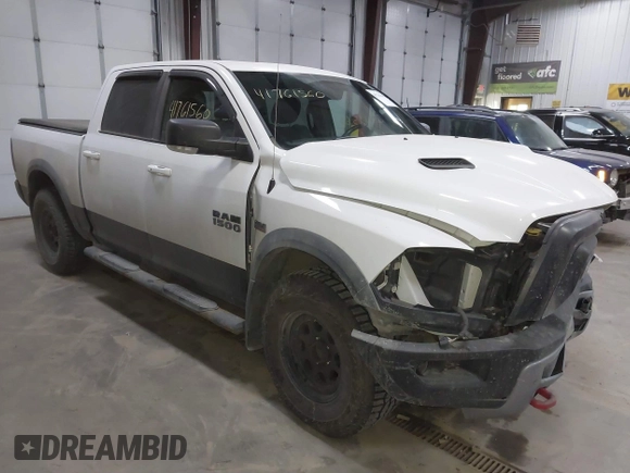 2016 Ram 1500 Rebel z VIN 1C6RR7YT6GS108472, wystawiony jako IAAI lot #41761560 z przebiegiem 101 132 mil mil oraz . Historia ofert i sprzedaży dostępna na DreamBid. Obrazek 1.