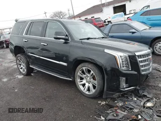 2018 Cadillac Escalade Luxury with VIN 1GYS4BKJXJR204245, listed as a IAAI auction lot 41933715 with 118,000 mi miles and . Bid and sale history available at DreamBid. Image 1.