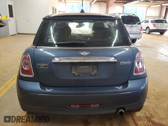2011 MINI Hardtop with VIN WMWSU3C54BT184251, listed as a Copart auction lot 59298135 with 123,864 mi miles and Salvage title. Bid and sale history available at DreamBid. Image 6.