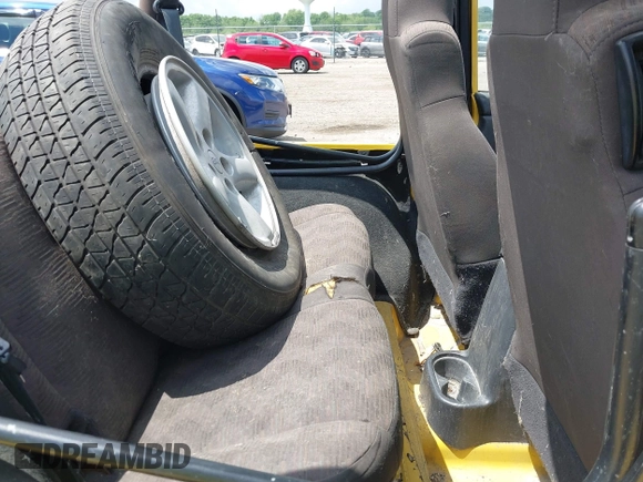 2004 Jeep Wrangler Sport z VIN 1J4FA49S04P701986, wystawiony jako IAAI lot #42256648 z przebiegiem 129 946 mil mil oraz . Historia ofert i sprzedaży dostępna na DreamBid. Obrazek 8.