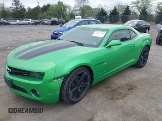 2011 Chevrolet Camaro 2LT z VIN 2G1FC1ED2B9142614, wystawiony jako IAAI lot #42043372 z przebiegiem 143 094 mil mil oraz . Historia ofert i sprzedaży dostępna na DreamBid. Obrazek 2.