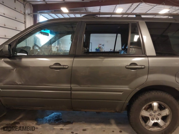2007 Honda Pilot EX-L with VIN 2HKYF187X7H528523, listed as a IAAI auction lot 40977045 with 139,463 mi miles. Bid and sale history available at carsss.com. Image 15.