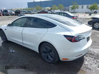 2020 Tesla Model 3 Long Range with VIN 5YJ3E1EB6LF619528, listed as a IAAI auction lot 41937430 with 70,327 mi miles. Bid and sale history available at carsss.com. Image 3.
