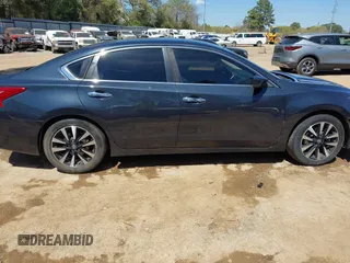2018 Nissan Altima SV with VIN 1N4AL3AP1JC104169, listed as a IAAI auction lot 41847432 with 228,737 mi miles and . Bid and sale history available at DreamBid. Image 13.
