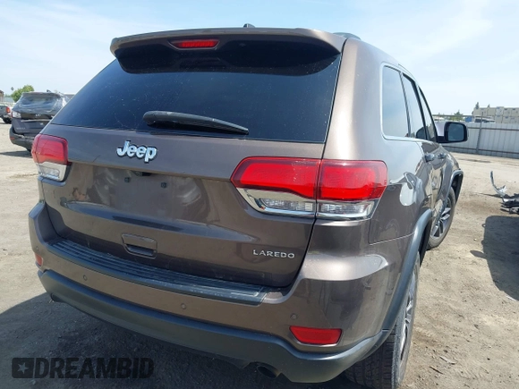 2020 Jeep Grand Cherokee Altitude with VIN 1C4RJEAG3LC220295, listed as a IAAI auction lot 42118183 with 104,097 mi miles and . Bid and sale history available at DreamBid. Image 4.