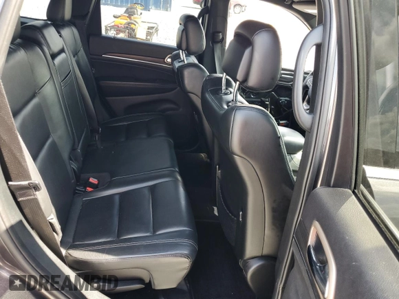 2017 Jeep Grand Cherokee Limited 75th Anniversary with VIN 1C4RJFBT0HC781742, listed as a Copart auction lot 55928265 with 122,277 mi miles and Salvage title. Bid and sale history available at DreamBid. Image 11.
