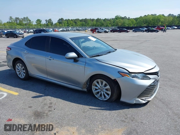 2020 Toyota Camry LE with VIN 4T1C11AK9LU341762, listed as a IAAI auction lot 42001577 with 84,991 mi miles and . Bid and sale history available at DreamBid. Image 1.
