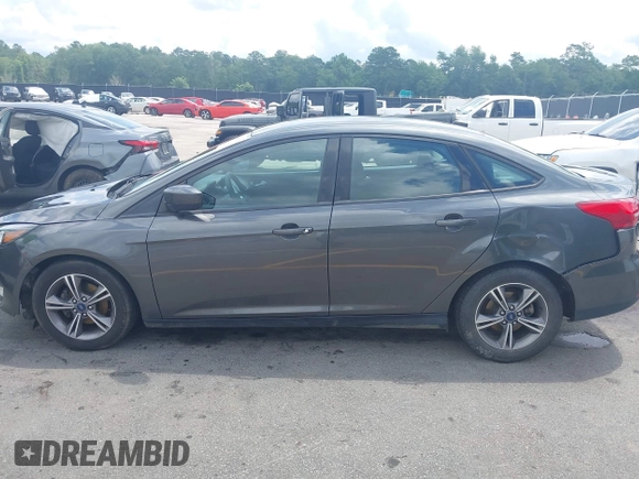 2018 Ford Focus SE with VIN 1FADP3FE2JL263954, listed as a IAAI auction lot 42480748 with 111,059 mi miles and . Bid and sale history available at DreamBid. Image 14.