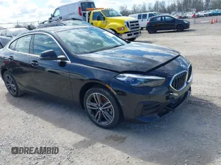2022 BMW 2 Series 228i with VIN WBA53AK08N7K11703, listed as a IAAI auction lot 41849046 with 51,616 mi miles. Bid and sale history available at carsss.com. Image 1.