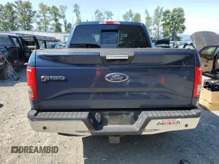2015 Ford F-150 XLT with VIN 1FTEW1EP7FKE12574, listed as a Copart auction lot 59519985 with 133,337 mi miles and Salvage title. Bid and sale history available at DreamBid. Image 6.