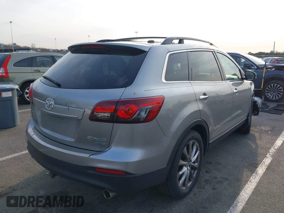 2015 Mazda CX-9 Grand Touring with VIN JM3TB3DA6F0447184, listed as a IAAI auction lot 41771865 with 137,814 mi miles. Bid and sale history available at carsss.com. Image 4.