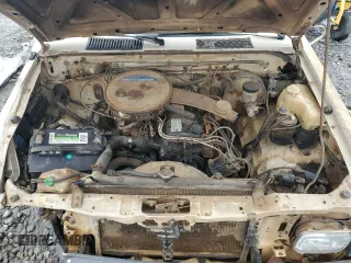 1986 Nissan Hardbody E z VIN JN6ND11S7GW014787, wystawiony jako Copart lot #45291425 z przebiegiem 171 557 mil mil oraz Szkody całkowita. Historia ofert i sprzedaży dostępna na DreamBid. Obrazek 11.