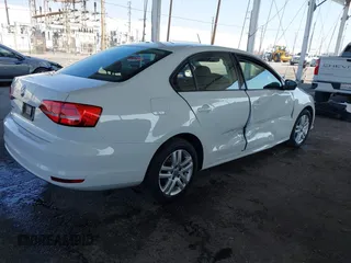 2015 Volkswagen Jetta Sedan 2.0L S with VIN 3VW2K7AJ3FM253125, listed as a IAAI auction lot 41535632 with 103,953 mi miles. Bid and sale history available at carsss.com. Image 4.