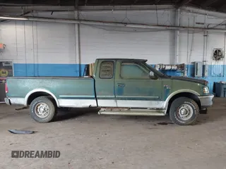 1998 Ford F-150 z VIN 1FTZX18W0WNB10429, wystawiony jako IAAI lot #42501385 z przebiegiem 175 318 mil mil oraz . Historia ofert i sprzedaży dostępna na DreamBid. Obrazek 13.