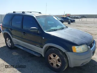 2001 Ford Escape XLT with VIN 1FMYU03141KF43980, listed as a IAAI auction lot 41989002 with 222,344 mi miles. Bid and sale history available at carsss.com. Image 1.