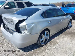 2014 Nissan Altima SL with VIN 1N4AL3AP7EN373903, listed as a IAAI auction lot 41877079 with 211,894 mi miles and . Bid and sale history available at DreamBid. Image 4.