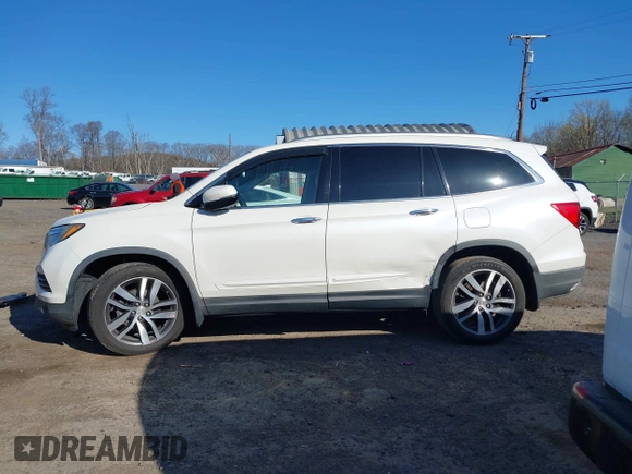 2016 Honda Pilot Touring with VIN 5FNYF6H98GB017079, listed as a IAAI auction lot 42055272 with 142,726 mi miles and . Bid and sale history available at DreamBid. Image 15.
