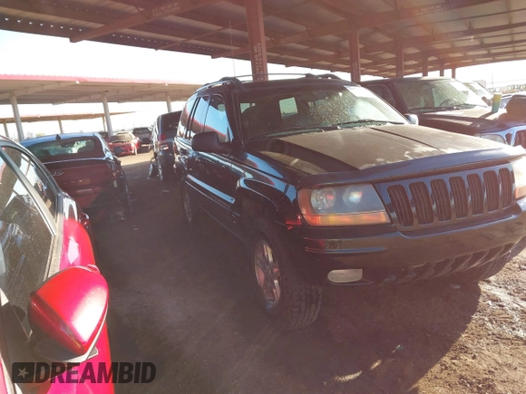 1999 Jeep Grand Cherokee Limited with VIN 1J4GW68N6XC675399, listed as a IAAI auction lot 41745815 with 217,800 mi miles. Bid and sale history available at carsss.com. Image 1.