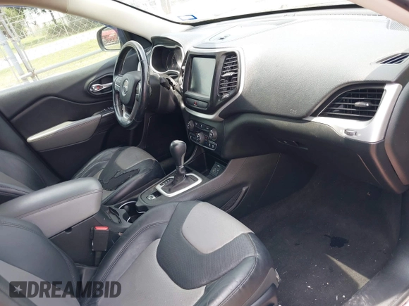 2014 Jeep Cherokee Limited with VIN 1C4PJLDS0EW134195, listed as a IAAI auction lot 42162971 with 182,272 mi miles and . Bid and sale history available at DreamBid. Image 5.
