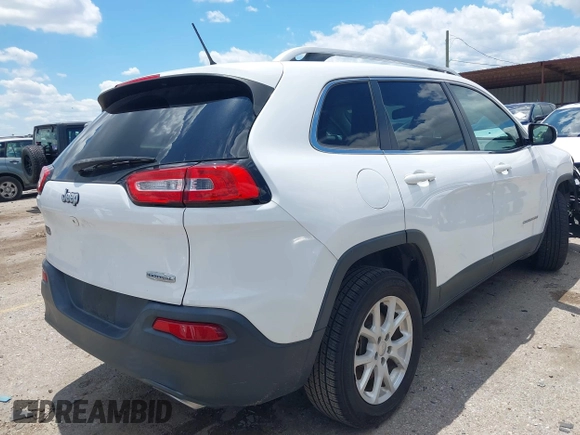 2018 Jeep Cherokee Latitude with VIN 1C4PJLCX3JD551801, listed as a IAAI auction lot 42226643 with 89,246 mi miles and . Bid and sale history available at DreamBid. Image 4.