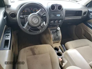 2015 Jeep Patriot Latitude with VIN 1C4NJPFB6FD241342, listed as a Copart auction lot 58004935 with 241,451 mi miles and Salvage title. Bid and sale history available at DreamBid. Image 8.