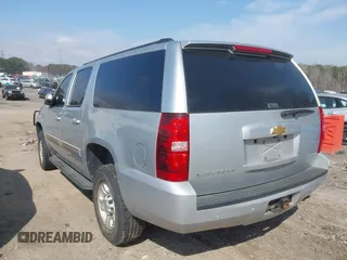 2013 Chevrolet Suburban LS z VIN 1GNWKLEGXDR305591, wystawiony jako IAAI lot #41785334 z przebiegiem 203 613 mil mil oraz . Historia ofert i sprzedaży dostępna na DreamBid. Obrazek 3.