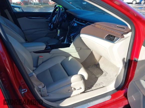 2014 Cadillac XTS Luxury z VIN 2G61N5S34E9163874, wystawiony jako IAAI lot #41649292 z przebiegiem 104 638 mil mil oraz . Historia ofert i sprzedaży dostępna na DreamBid. Obrazek 5.