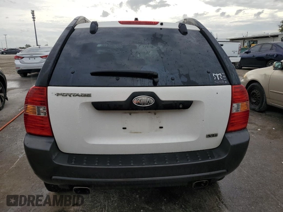 2005 Kia Sportage LX with VIN KNDJF723557078730, listed as a Copart auction lot 79823504 with 166,509 mi miles and Salvage Title. Bid and sale history available at carsss.com. Image 6.