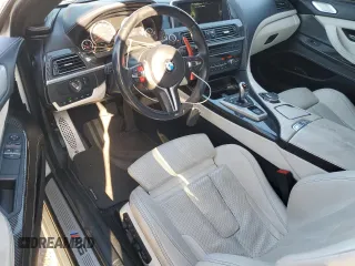 2015 BMW M6 z VIN WBSLX9C51FD160757, wystawiony jako Copart lot #51991315 z przebiegiem 71 133 mil mil oraz Szkody całkowita. Historia ofert i sprzedaży dostępna na DreamBid. Obrazek 8.
