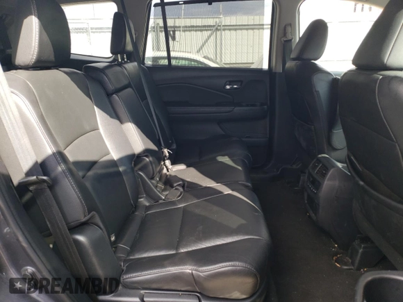 2019 Honda Pilot EX-L z VIN 5FNYF6H56KB067758, wystawiony jako Copart lot #45884515 z przebiegiem 104 662 mil mil oraz Szkoda całkowita • Salvage title. Historia ofert i sprzedaży dostępna na DreamBid. Obrazek 11.