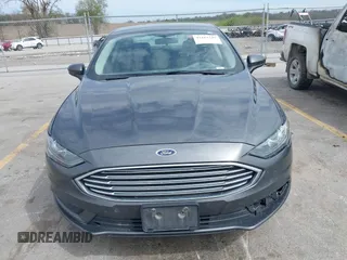 2017 Ford Fusion SE with VIN 3FA6P0H7XHR228922, listed as a IAAI auction lot 42162345 with 186,000 mi miles and . Bid and sale history available at DreamBid. Image 12.