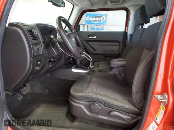 2009 Hummer H3 with VIN 5GNEN13E998144228, listed as a Copart auction lot 70231814 with 119,203 mi miles and Clean Title. Bid and sale history available at DreamBid. Image 7.