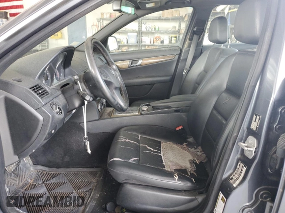 2009 Mercedes-Benz C 350 Sport with VIN WDDGF56XX9R043614, listed as a Copart auction lot 62166555 with 154,142 mi miles and Salvage title. Bid and sale history available at DreamBid. Image 7.