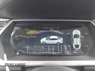 2013 Tesla Model S with VIN 5YJSA1DG7DFP11382, listed as a IAAI auction lot 42056169 with 126,975 mi miles. Bid and sale history available at carsss.com. Image 18.