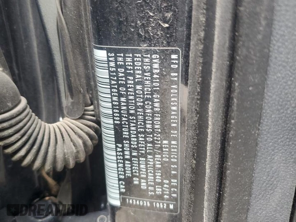 2014 Volkswagen Beetle 1.8T w/Premium z VIN 3VW517AT6EM816698, wystawiony jako Copart lot #57344055 z przebiegiem 52 782 mil mil oraz Szkoda całkowita • Salvage title. Historia ofert i sprzedaży dostępna na DreamBid. Obrazek 12.