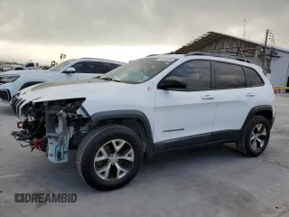 2014 Jeep Cherokee Trailhawk with VIN 1C4PJMBS3EW294676, listed as a Copart auction lot 47652335 with 161,663 mi miles and Salvage Title. Bid and sale history available at carsss.com. Image 1.