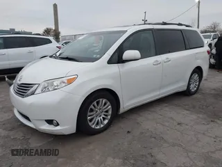 2015 Toyota Sienna XLE with VIN 5TDYK3DC9FS595827, listed as a IAAI auction lot 41014820 with 119,143 mi miles. Bid and sale history available at carsss.com. Image 17.